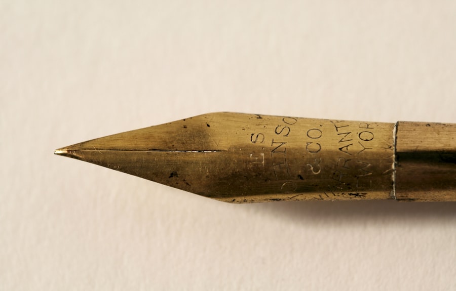 Antique dip pen nib, evoking the firm's 1938 origins